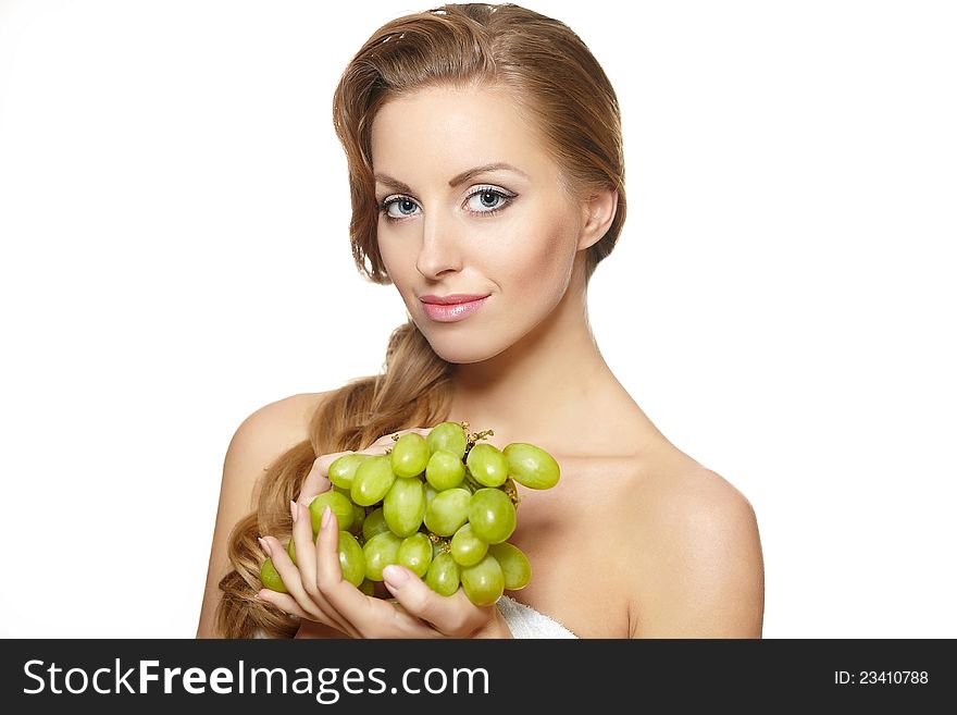 Beautiful  woman holding a bunch of grape