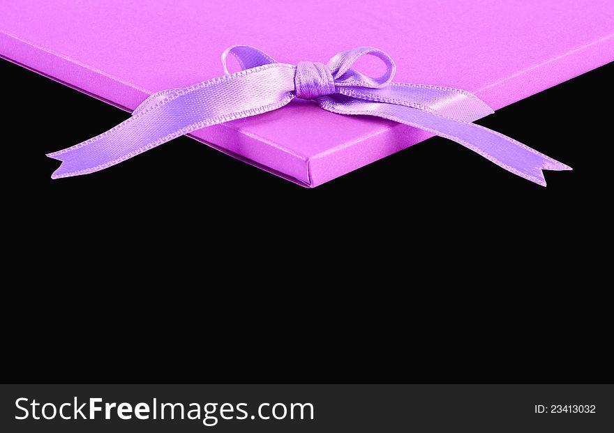 Pink compliment card on black background