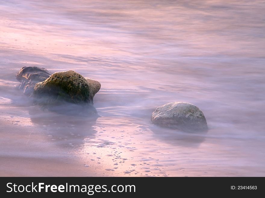 Sea surf with stones on the beach. Sea surf with stones on the beach