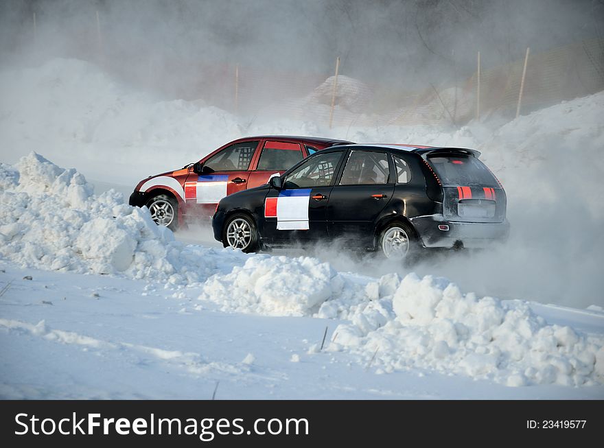 Two cars together on an input in turn track, automobile ice on race. Two cars together on an input in turn track, automobile ice on race