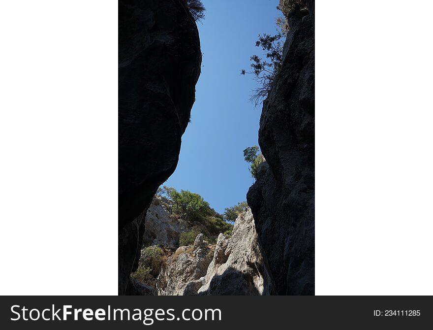 Beautiful landscape on the island of Rhodes. Magnificent mountainous landscape in the vicinity of the parched riverbed of the Loutani river. Kolympia, Rhodes, Greece