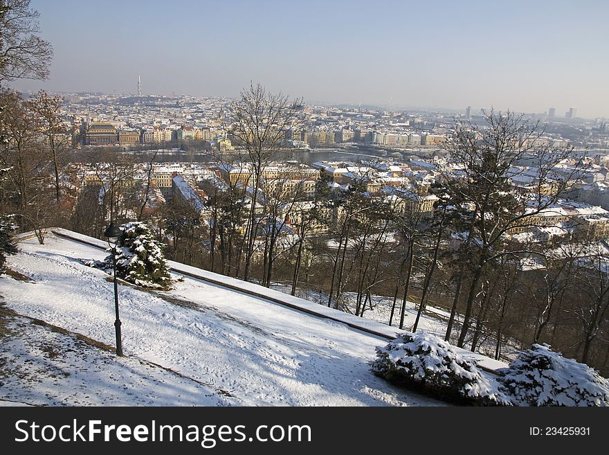 Winter panorama from the viewing threshold, Prague under snow, a view of the river, view from above the threshold, snowy sunny day in Prague. Winter panorama from the viewing threshold, Prague under snow, a view of the river, view from above the threshold, snowy sunny day in Prague