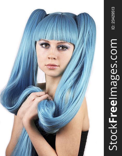 Portrait of pretty woman in blue wig on white background