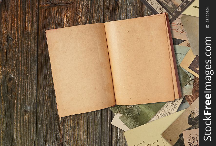 Vintage book on wooden background. Vintage book on wooden background