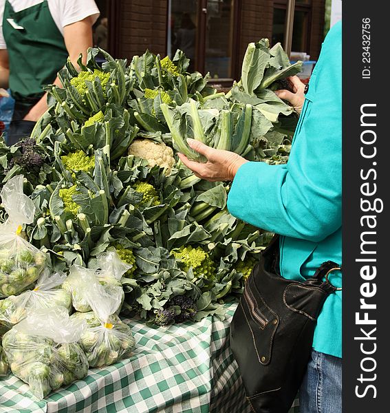 Mature lady holding cauliflower