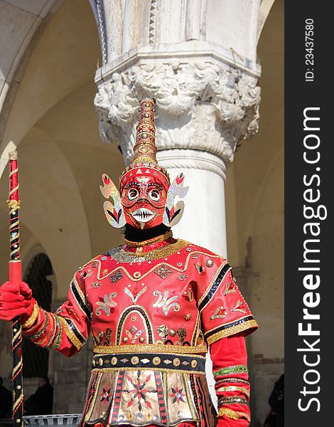 An asian carnival mask in Venice, Italy.
