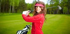 Woman Playing Golf On A Green Stock Photography