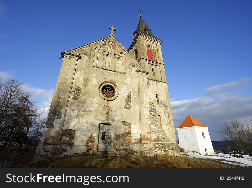 Old abandoned church of st. mary magdalene in the area of former castle Schwamberg. Besides a bell renovated bell tower building. Old abandoned church of st. mary magdalene in the area of former castle Schwamberg. Besides a bell renovated bell tower building