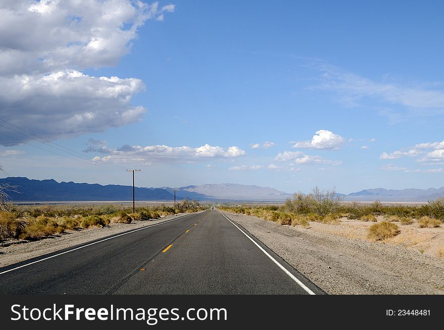 Straight road in Death Valley. Nevada, US. Straight road in Death Valley. Nevada, US