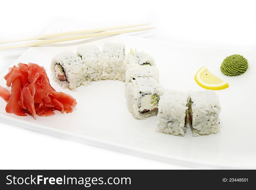 Sushi rice decorated with red fish and lemon