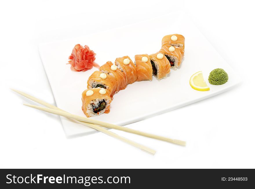 Japanese sushi of salmon on a white plate