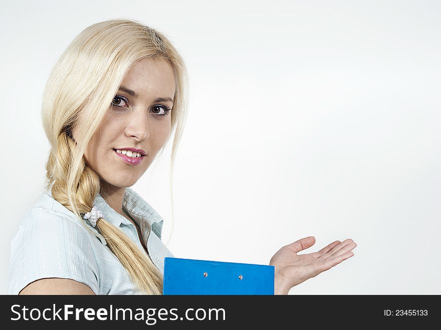 A beautiful girl with a folder indicates hand on the background of