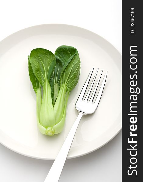 Chinese cabbage on a white plate