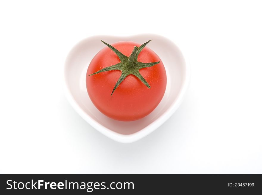 Ripe red tomato of the white back