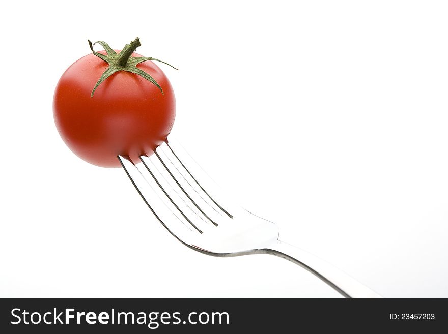 The tomato which stuck in a fork