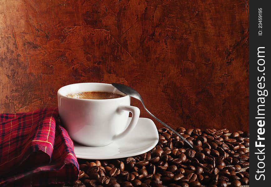 Hot coffee against a dark background