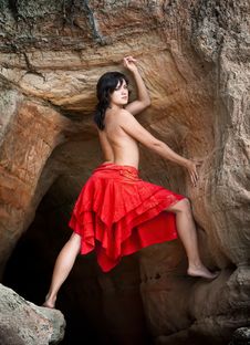 Girl In Red And Sandstone Stock Photography