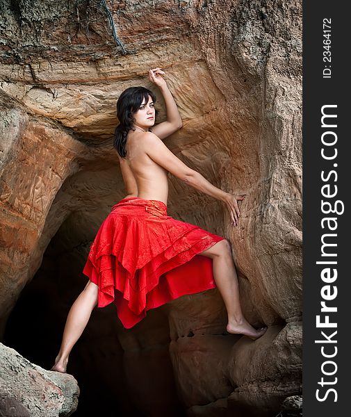 Girl In Red And Sandstone