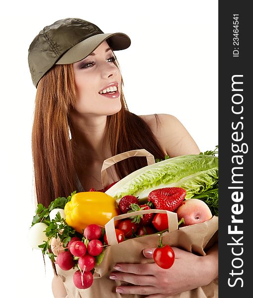 Healthy lifestyle - cheerful woman with fruit shopping paper bag on white background. Healthy lifestyle - cheerful woman with fruit shopping paper bag on white background