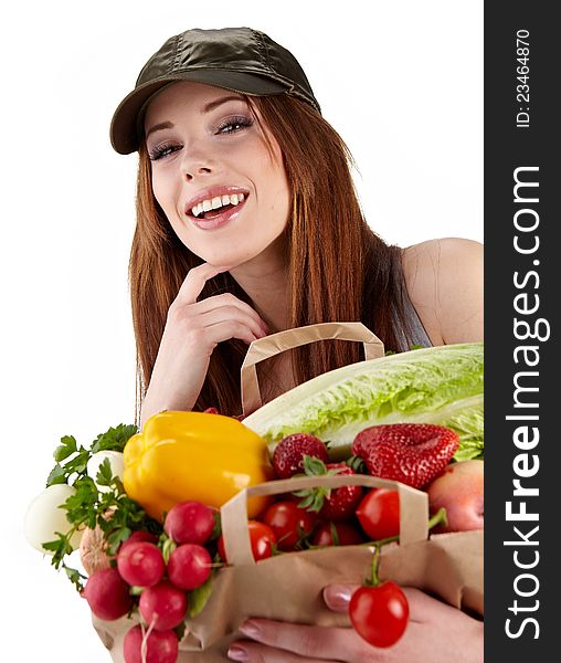 Healthy lifestyle - cheerful woman with fruit shopping paper bag on white background. Healthy lifestyle - cheerful woman with fruit shopping paper bag on white background