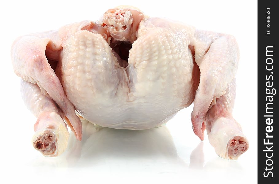 Raw chicken on white background