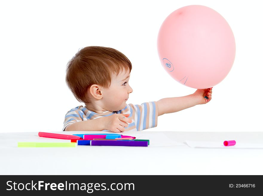 Little child with color felt pen over white. Little child with color felt pen over white