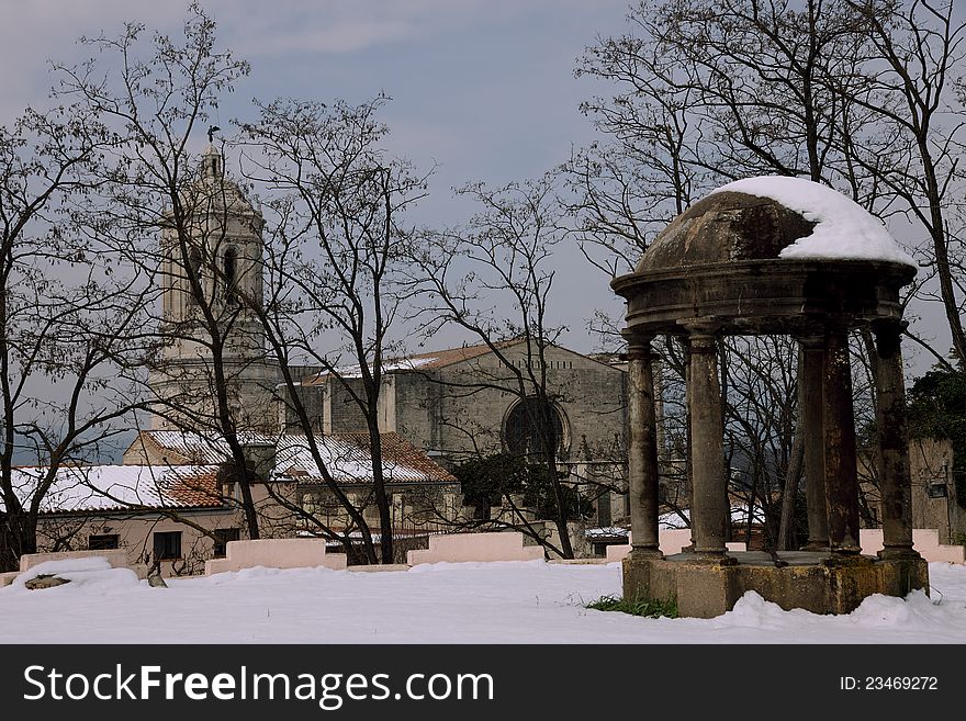 Old Roman chapel in Girona in the snow. Old Roman chapel in Girona in the snow.