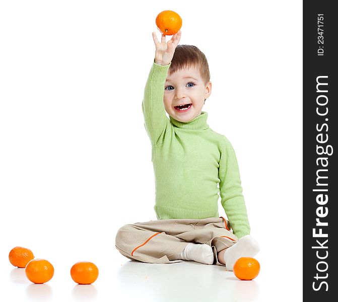Smiling child with fruits over white background. Smiling child with fruits over white background