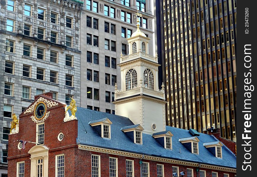 The Old State House is dwarfed by Boston's old and new skyscrapers. The Old State House is dwarfed by Boston's old and new skyscrapers.