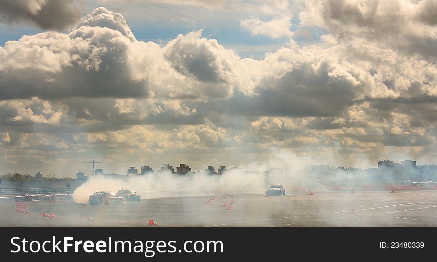 Smoke clouds drift speed the machine sunset. Smoke clouds drift speed the machine sunset