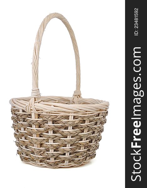 Wicker basket on white background