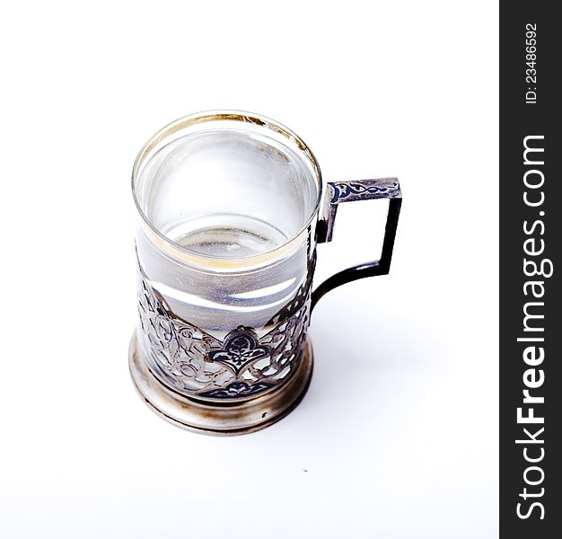 Glass with clear water on white background