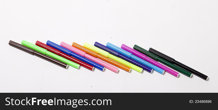 Group of bright color markers on white background. Group of bright color markers on white background