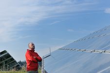 Engineer Using Laptop At Solar Panels Plant Field Stock Photos Engineer Using Laptop At Solar Panels Plant Field Stock Photos