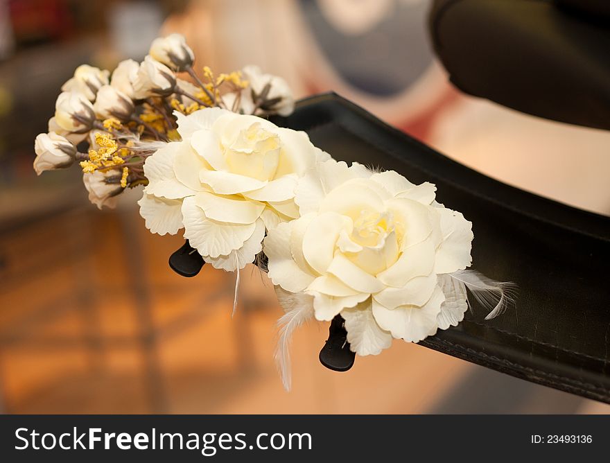 Artificial flowers on the car.