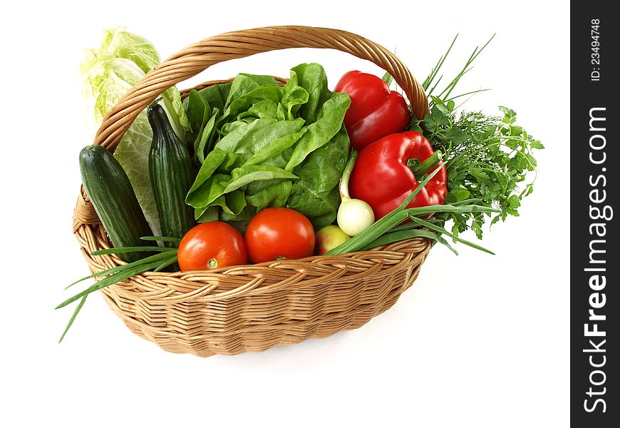 Isolated basket with vegetables