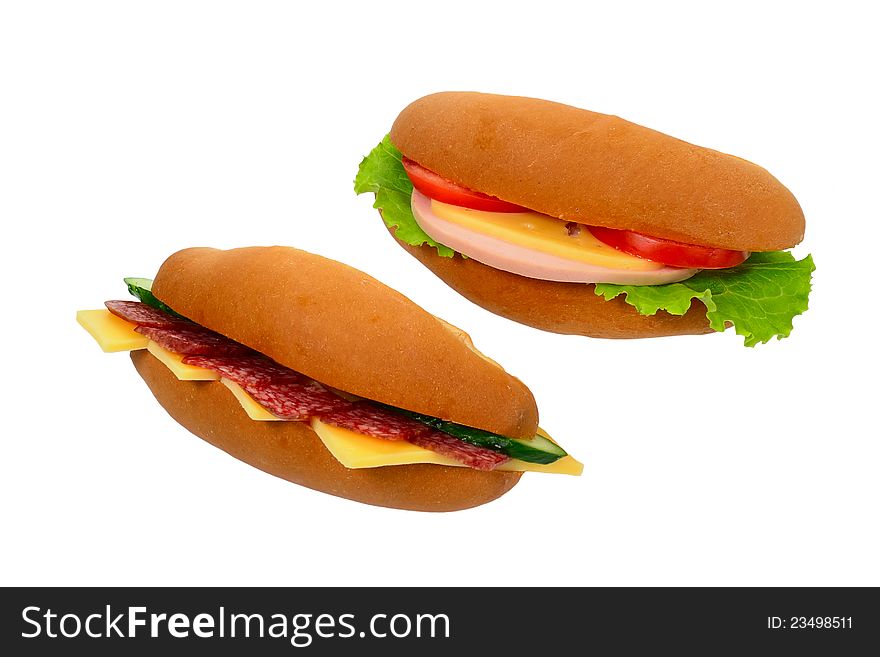 Two sandwich with sausage and vegetables isolated on white background