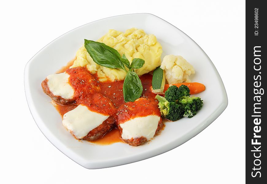 Veal with tomato and cheese on white square dish isolated on a white background