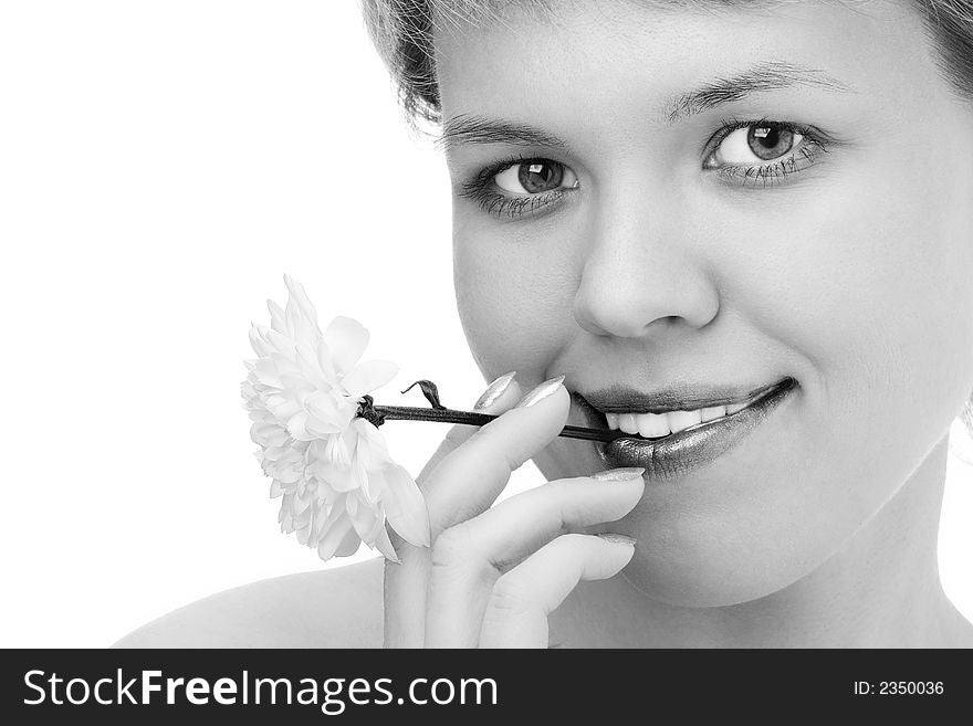 Close-ups lovely woman smile portrait with white chrysanthemum in mouth