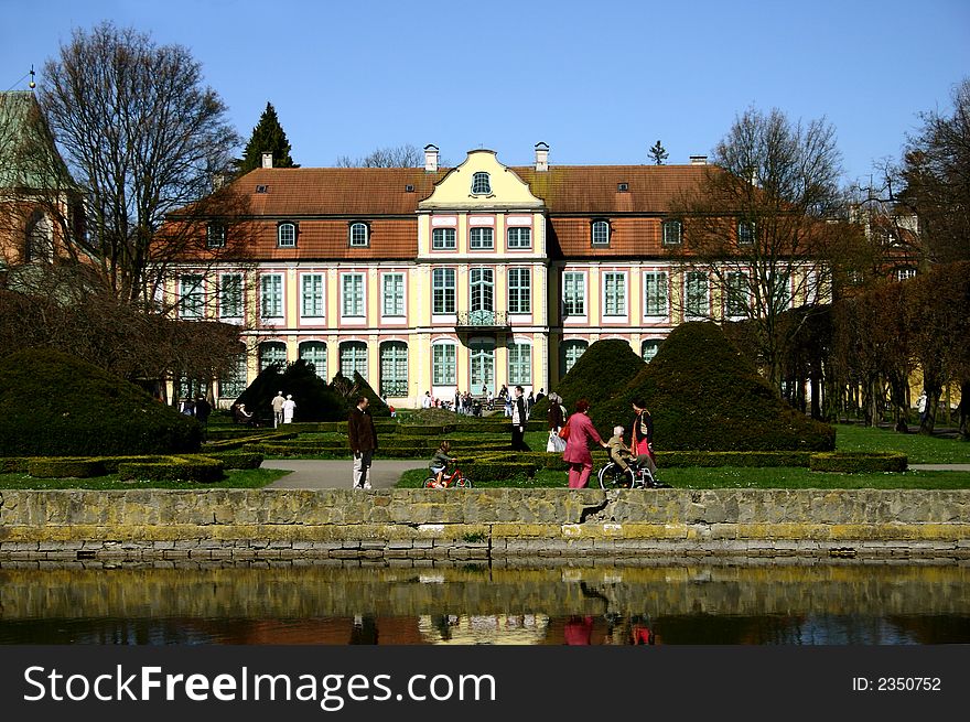 Historical palace standing in the old park during early spring