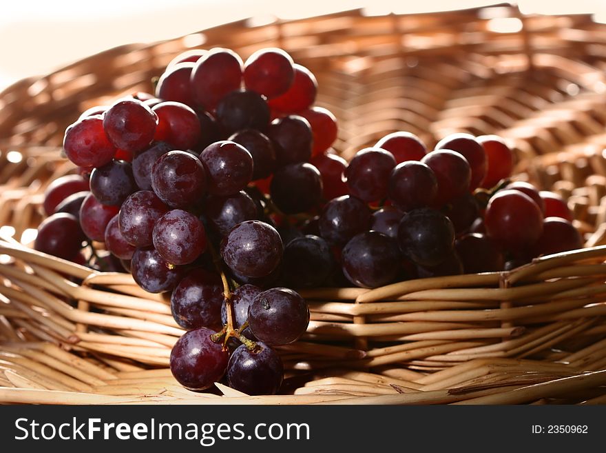 Ripe grapes in a basket