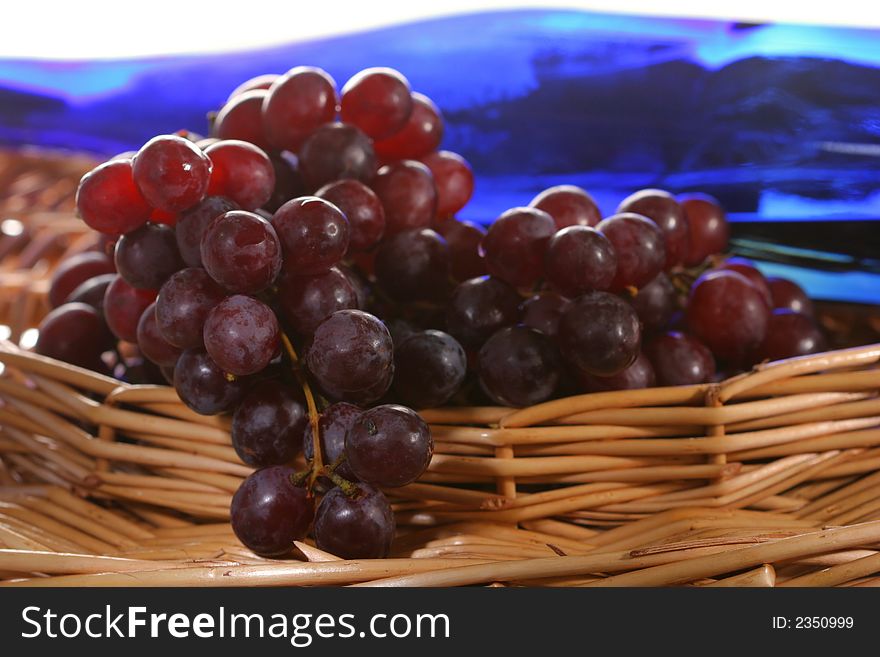 Grapevine, leaf and wine in a basket. Grapevine, leaf and wine in a basket