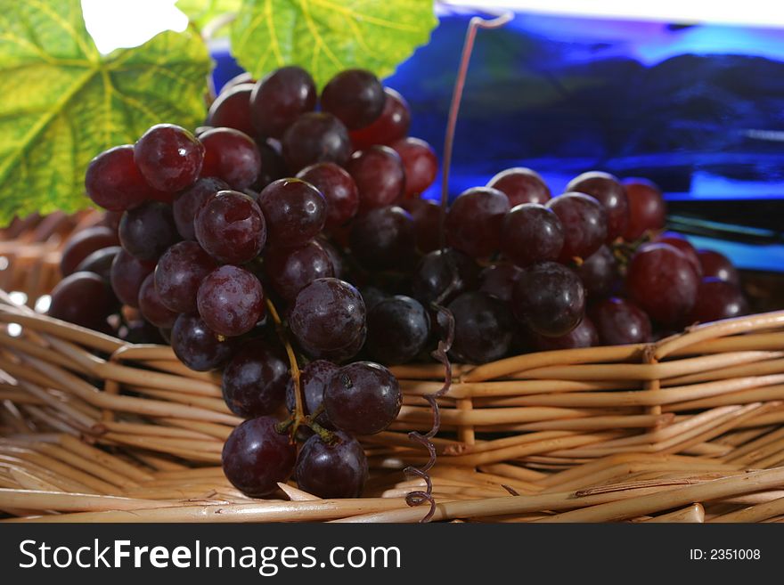 Grapes with leaf and wine