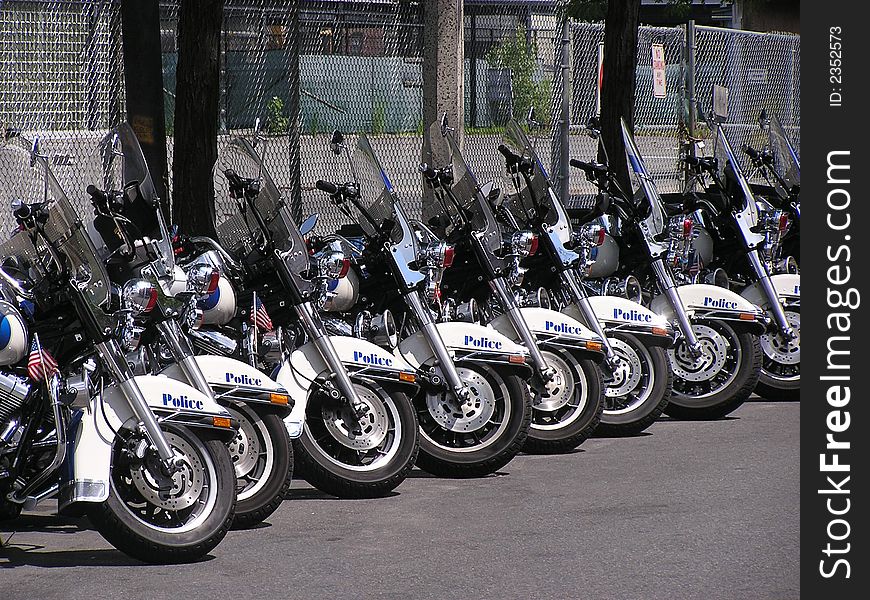 Police motor cycles parked on the street