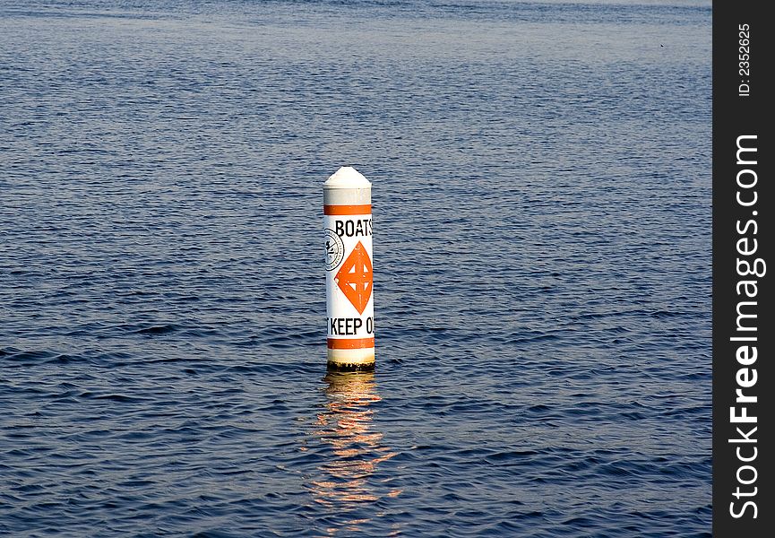 Boat warning buoy in water