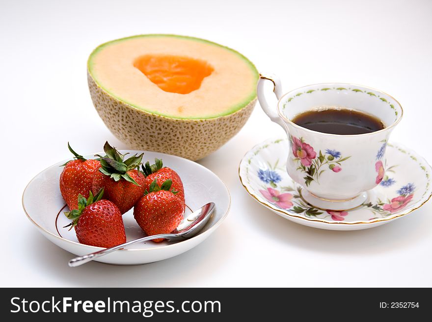 Colorful display of fruit and tea or coffee. Colorful display of fruit and tea or coffee.