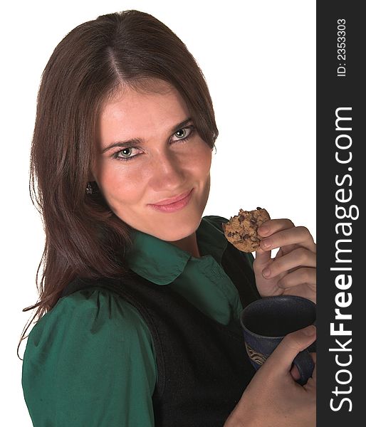 Professional young white lady looking at me eating a biscuit green shirt. White isolated back ground. Black jacket. Professional young white lady looking at me eating a biscuit green shirt. White isolated back ground. Black jacket