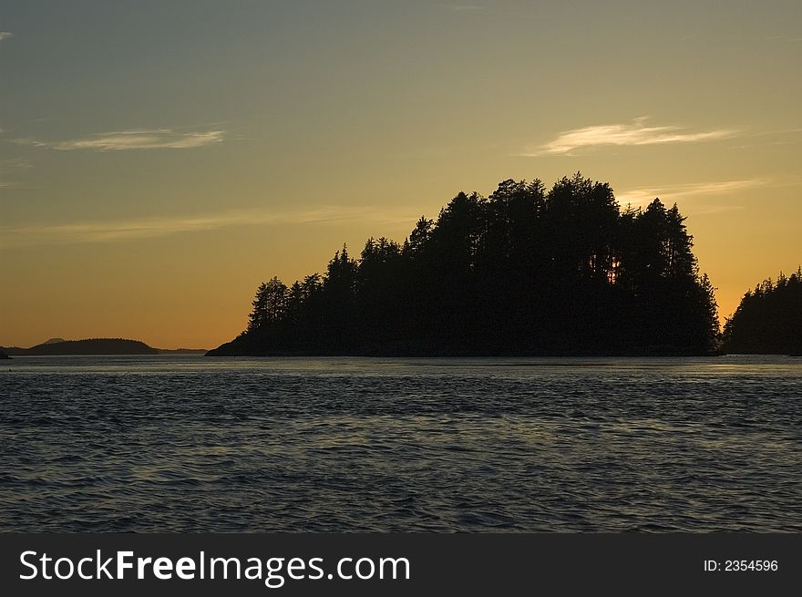 Small pacific island in the sundown. Small pacific island in the sundown