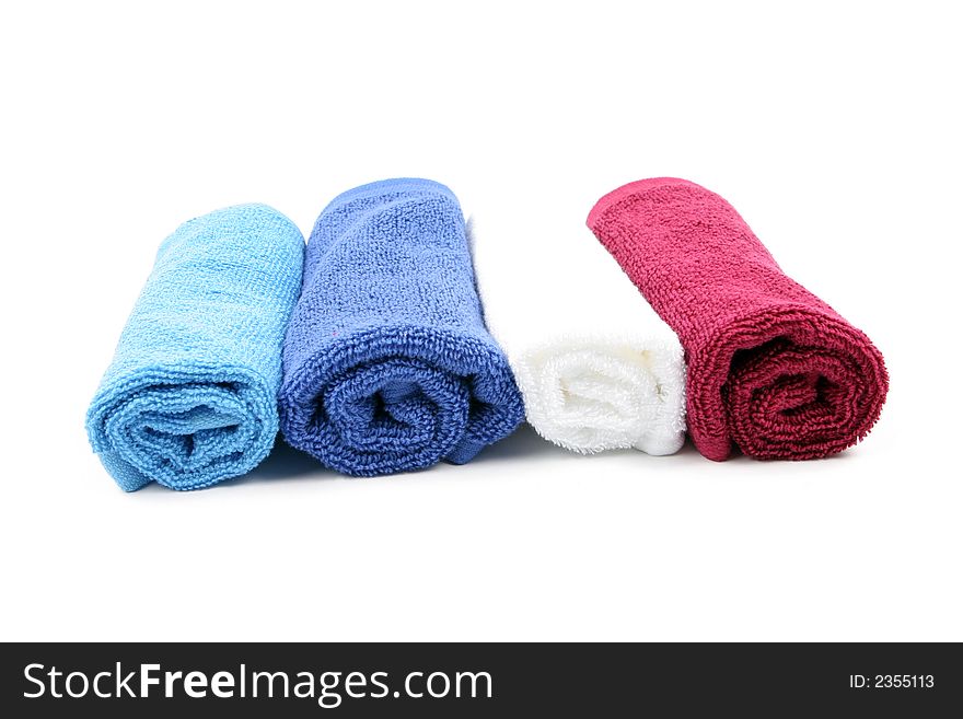 Colorful towels isolated on a white background