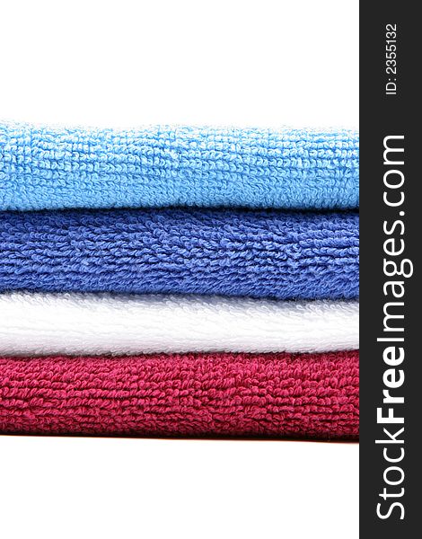 Colorful towels isolated on a white background